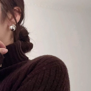 Minimalist S925 sterling silver ball stud earrings shown on model with vintage style