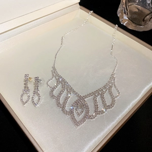 Sparkling silver rhinestone fringe necklace and earring set in a premium jewelry gift box