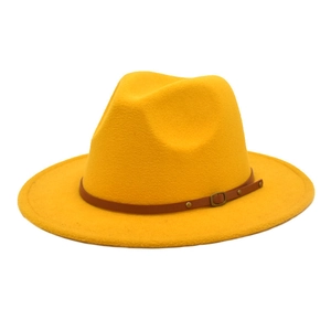 Detail of a bright yellow wool fedora featuring a brown leather belt with a metal buckle