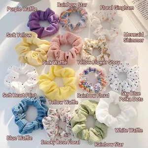 Floral and waffle fabric oversized scrunchies in various colorful patterns and styles