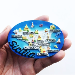 Detailed close-up of a 3D resin Sicily Italy souvenir magnet held by hand