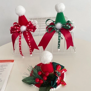 Handmade Christmas mini top hat hair clips with velvet bows and festive fur balls
