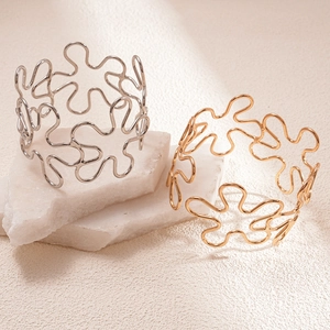 Abstract hollow flower open cuff bracelets in polished gold and silver metal finishes