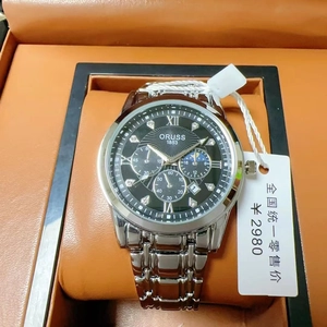 Detail view of ORUSS men's quartz watch with black dial and silver stainless steel strap