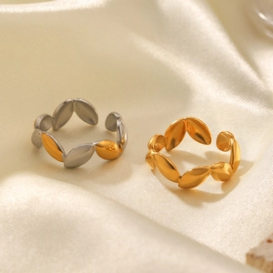Adjustable stainless steel olive leaf rings in gold and mixed silver finish on silk