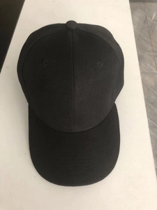 Top view of black cotton twill baseball cap showing six-panel structure and button detail