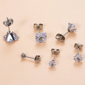 Square-cut zircon stud earrings in various sizes with classic four-prong stainless steel setting