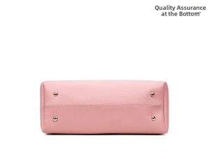 Detail of pink faux leather handbag bottom with four protective gold metal feet studs