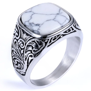 Detailed view of vintage silver square white turquoise ring with engraved scroll patterns