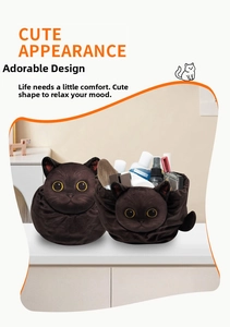 Detail of black cat plush drawstring bag showing its facial design and storage capacity