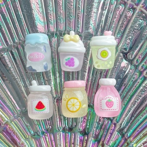 Miniature resin juice bottles with glitter in various fruit styles for DIY crafts