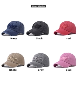 Detail display of six vintage washed cotton New York baseball caps with embroidery