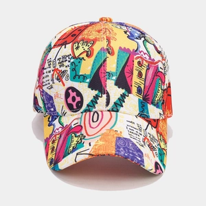 Close-up of vibrant street-style graffiti prints on a reinforced canvas baseball cap