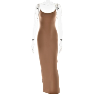 Detailed view of brown bodycon maxi dress with white tie-up knot shoulder straps