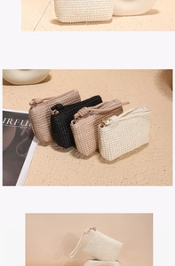 Detail of woven straw coin purse showing zipper closure, handle and multiple color options