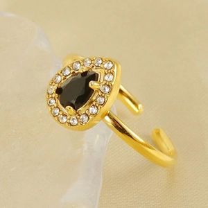 Detailed close-up of adjustable 18k gold plated ring with pear-cut black zircon and halo
