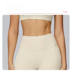 Detail of high-waist yoga pants and seamless sports bra with tummy control features