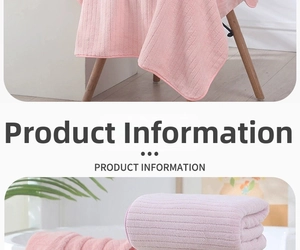Detail of pink coral fleece towel showing thick absorbent stripes and soft texture