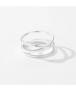 Macro shot of polished S925 sterling silver minimalist multi-layered crisscross ring