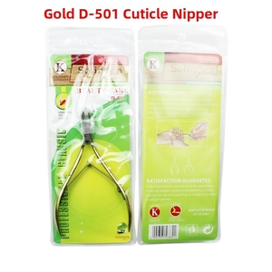 Macro detail of D-501 golden stainless steel cuticle nipper in blister card packaging
