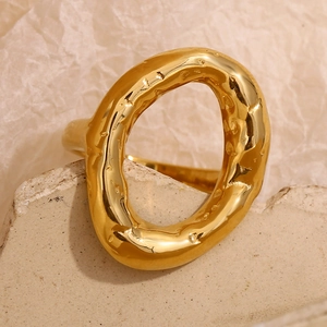 Irregular hammered 18K gold plated stainless steel ring with organic molten texture