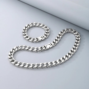 Ensemble collier et bracelet en maille gourmette en acier titane argenté poli