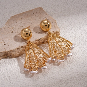 18K gold plated mesh hollow earrings with small white beads on a textured stone