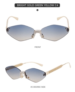 Close-up of rimless gradient diamond lenses and ornate hollow gold metal temples