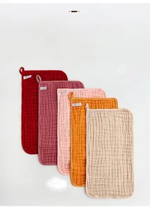 Detailed texture of six-layer cotton muslin towels with soft 3D honeycomb weave design