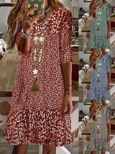 Floral V-neck mid-length dress with 3/4 sleeves available in four diverse summer colors