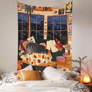 Detail of bohemian tapestry featuring a warm winter reading scene with snow mountain view