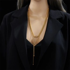 Double-layered gold titanium steel necklace with rectangular pendant and lariat chain