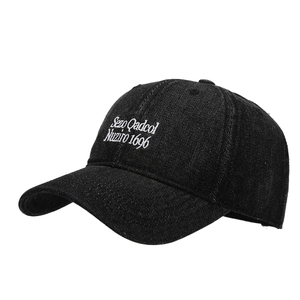 Retro black denim baseball cap with white letter embroidery for a street style look