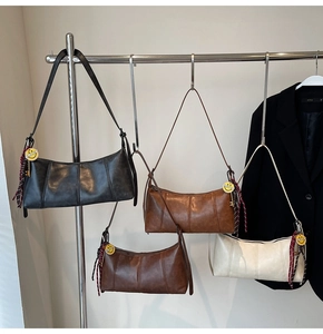 Selection of retro faux leather shoulder bags in four colors with smiley charms