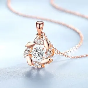 Close-up of S925 sterling silver rose gold necklace featuring a sparkling dancing stone