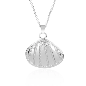 Macro shot of silver shell pendant with detailed stripes on a stainless steel chain