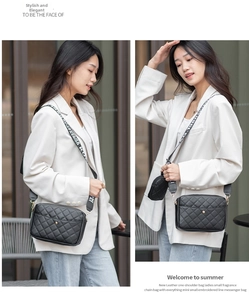 Detail of quilted crossbody bag with black-and-white letter strap and round coin purse
