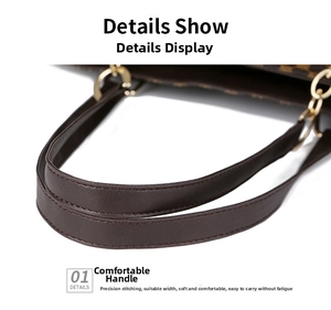 Detailed close-up of brown leather handle with precision stitching and gold metal buckle