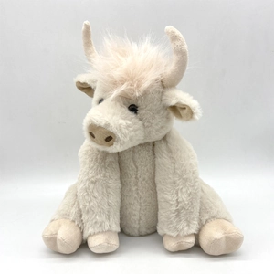 Cute beige highland cow plush toy with long fluffy hair in a sitting position