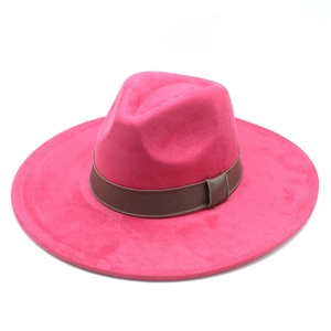 Close-up of rose red wide brim fedora hat with brown grosgrain ribbon detailing