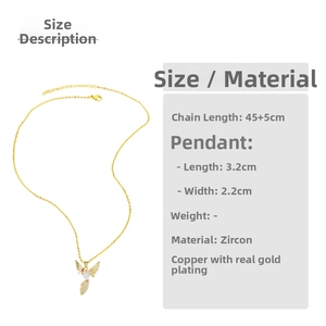 Detail showing dimensions of gold hummingbird necklace with white zircon and red gem eye