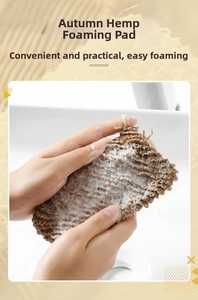 Macro shot of natural jute soap bag showing coarse fiber texture and rich foam bubbles