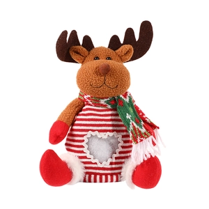 DIY Christmas reindeer felt candy bag with a heart-shaped window on white background