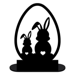 Detail of laser-cut black Easter bunny silhouettes with hollow hearts on a flat base