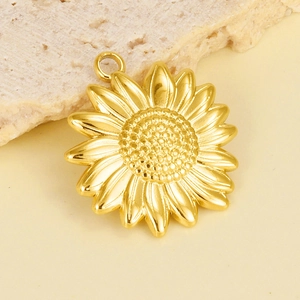 Detailed close-up of a golden stainless steel sunflower pendant with intricate petal textures