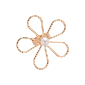 Golden hollow flower ring with central pearl accent on white background for women