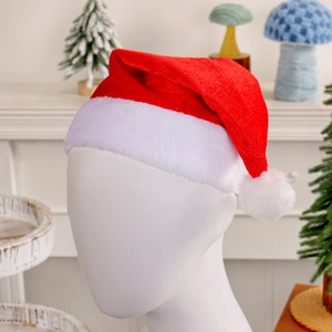 Classic red velvet Christmas hat with white plush brim and pompom on a mannequin head