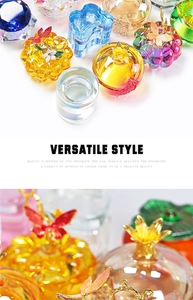 Detail of colorful faceted crystal nail cups with elegant butterfly and crown lids