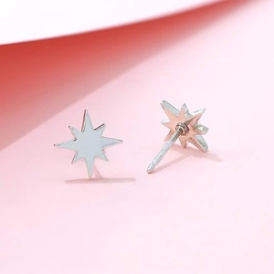 Elegant S925 sterling silver eight-pointed star stud earrings in minimalist white finish