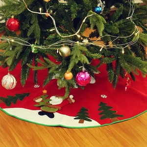 Red Christmas tree skirt with 3D Santa Claus and trees embroidery on wood floor